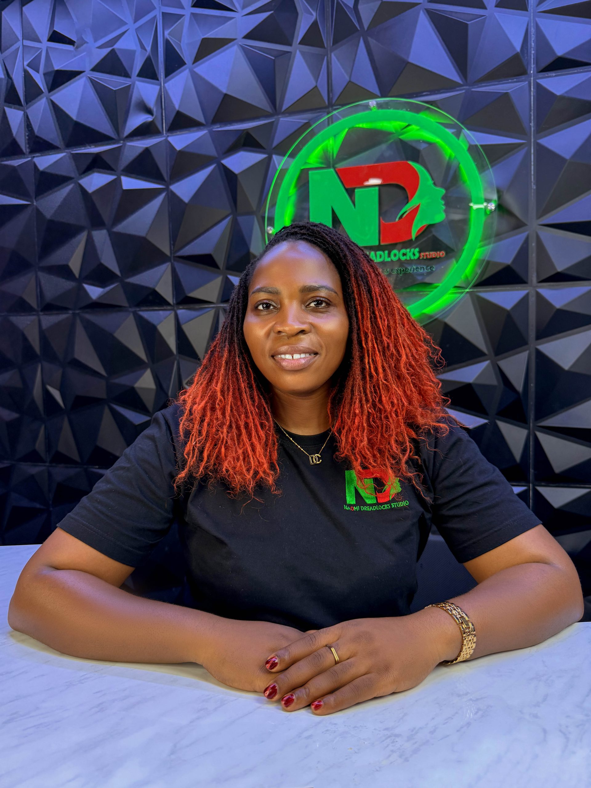 Azinwi Naomi - CEO of Naomi Dreadlocks Studio